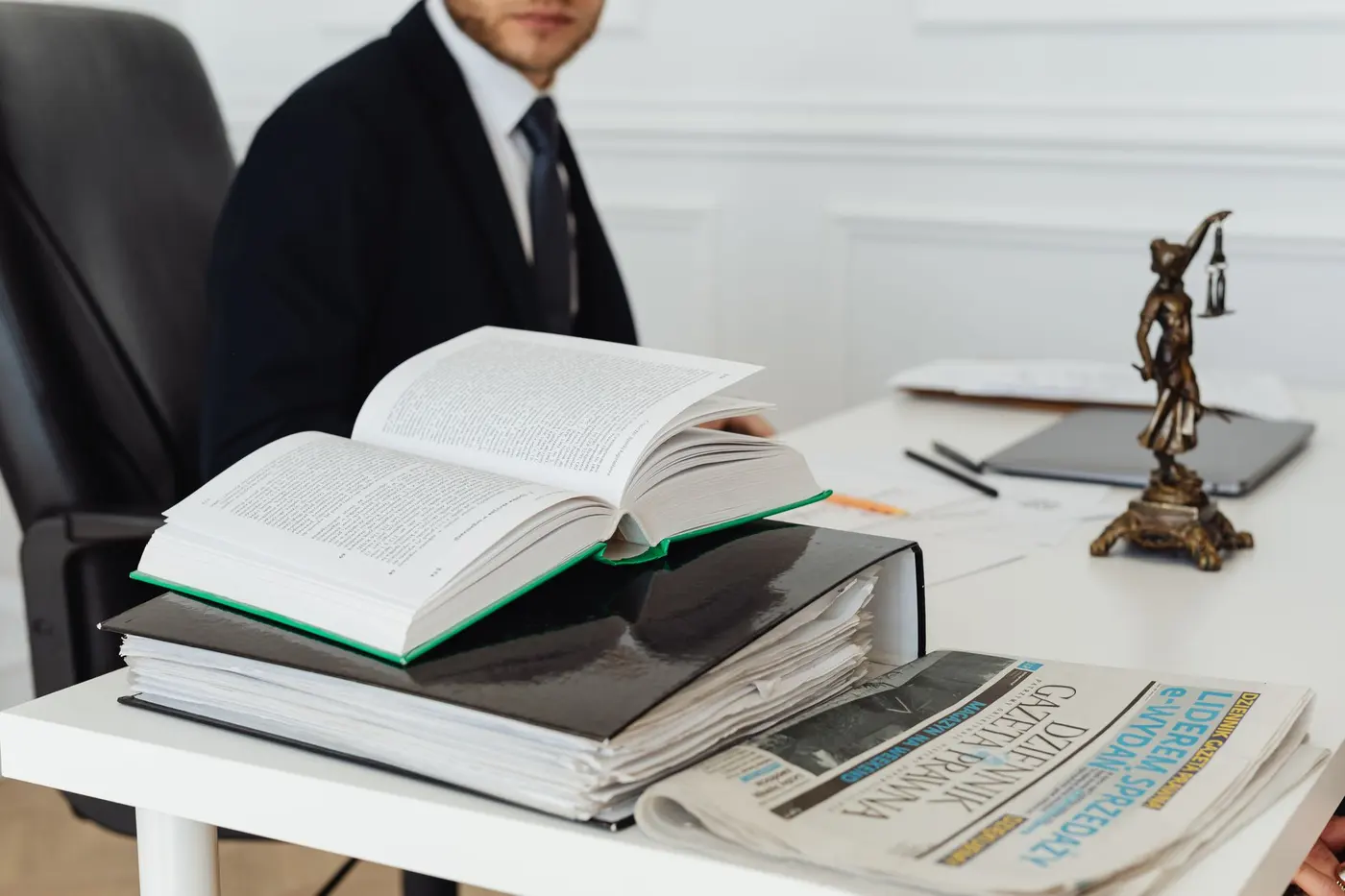 Modern law firm desk with phone and case files
